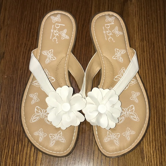 white flower flip flops